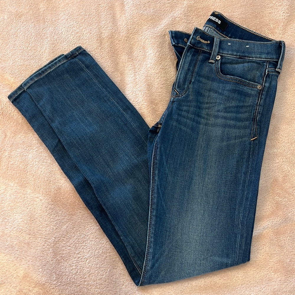 Women’s Skinny Mid-Rise jean by Express in size 0